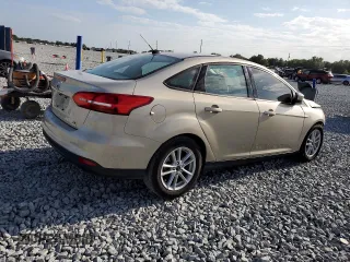 2018 Ford Focus SE with VIN 1FADP3FE4JL201052, listed as a Copart auction lot 51893595 with 87,627 mi miles and Salvage Title. Bid and sale history available at carsss.com. Image 3.