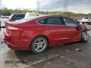 2015 Ford Fusion Titanium Hybrid with VIN 3FA6P0RUXFR247357, listed as a Copart auction lot 55943975 with 112,278 mi miles and Salvage title. Bid and sale history available at DreamBid. Image 3.