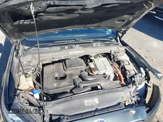 2015 Ford Fusion S Hybrid with VIN 3FA6P0UU7FR117785, listed as a IAAI auction lot 41589546 with 136,657 mi miles. Bid and sale history available at carsss.com. Image 10.
