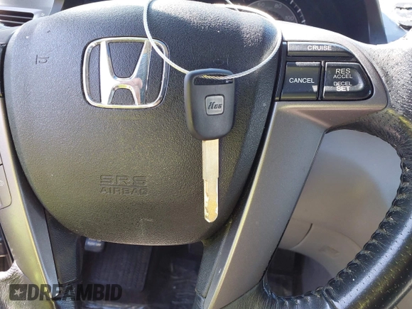 2011 Honda Odyssey EX-L with VIN 5FNRL5H6XBB073482, listed as a IAAI auction lot 42090463 with 213,061 mi miles and . Bid and sale history available at carsss.com. Image 11.