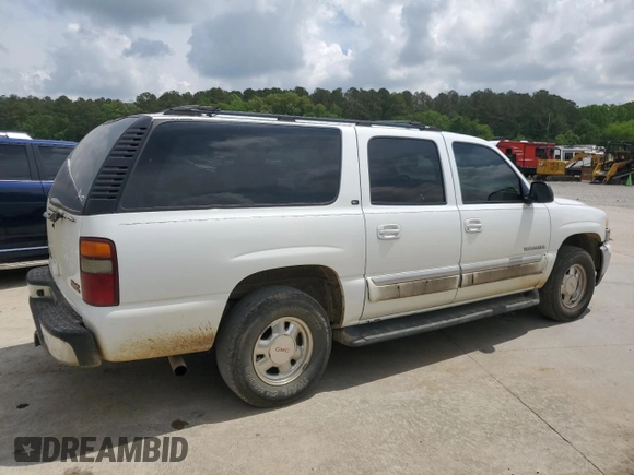 2002 GMC Yukon XL SLT z VIN 1GKFK16Z52J265501, wystawiony jako Copart lot #54234715 z przebiegiem 283 203 mil mil oraz Szkody całkowita. Historia ofert i sprzedaży dostępna na DreamBid. Obrazek 3.