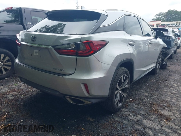 2018 Lexus RX 350 z VIN 2T2ZZMCA4JC100212, wystawiony jako IAAI lot #42197456 z przebiegiem 63 078 mil mil oraz . Historia ofert i sprzedaży dostępna na DreamBid. Obrazek 4.