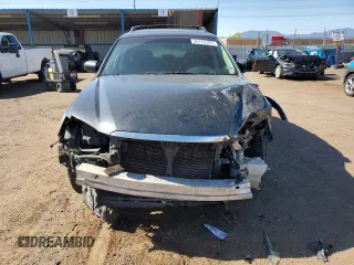 2009 Subaru Outback Limited z VIN 4S4BP66C997340188, wystawiony jako Copart lot #56733395 z przebiegiem 145 370 mil mil oraz Szkoda całkowita • Salvage title. Historia ofert i sprzedaży dostępna na DreamBid. Obrazek 5.