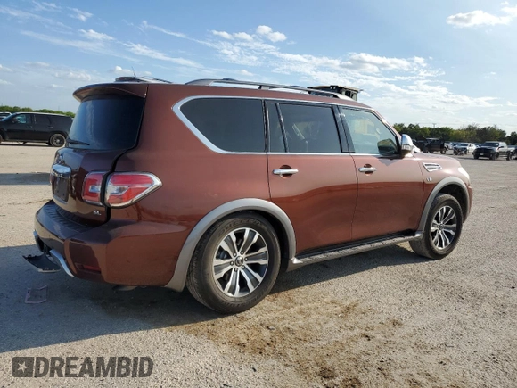 2017 Nissan Armada SL with VIN JN8AY2ND8H9010517, listed as a Copart auction lot 61785834 with 142,157 mi miles and Salvage Title. Bid and sale history available at carsss.com. Image 3.