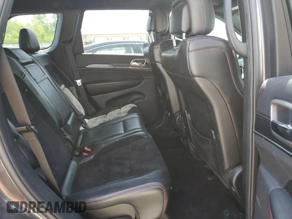 2017 Jeep Grand Cherokee Trailhawk with VIN 1C4RJFLGXHC654112, listed as a Copart auction lot 56397195 with 168,136 mi miles and Salvage title. Bid and sale history available at DreamBid. Image 11.