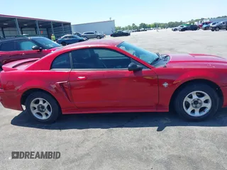 1999 Ford Mustang with VIN 1FAFP4042XF229616, listed as a IAAI auction lot 42047185 with 287,758 mi miles and . Bid and sale history available at DreamBid. Image 13.