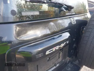 1998 Honda CR-V LX z VIN JHLRD1740WC076533, wystawiony jako IAAI lot #42046673 z przebiegiem 201 946 mil mil oraz . Historia ofert i sprzedaży dostępna na DreamBid. Obrazek 13.