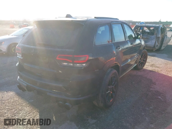 2018 Jeep Grand Cherokee High Altitude with VIN 1C4RJFCT4JC378030, listed as a IAAI auction lot 41319022 with 113,806 mi miles. Bid and sale history available at carsss.com. Image 4.
