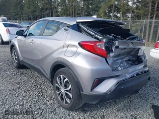 2020 Toyota C-HR LE with VIN JTNKHMBXXL1077939, listed as a IAAI auction lot 42044122 with 47,140 mi miles. Bid and sale history available at carsss.com. Image 3.