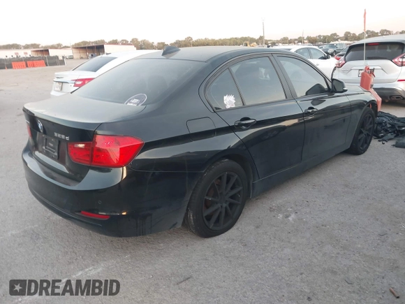 2014 BMW 3 Series 328d xDrive with VIN WBA3D5C50EF147099, listed as a IAAI auction lot 40528743 with 190,443 mi miles and . Bid and sale history available at DreamBid. Image 4.