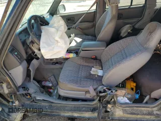 1998 Jeep Cherokee Sport with VIN 1J4FT68S9WL141631, listed as a Copart auction lot 68974974 with 0 mi miles and Salvage Title. Bid and sale history available at carsss.com. Image 7.