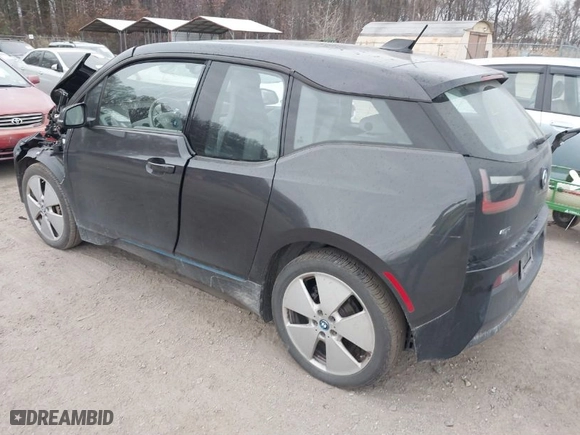 2015 BMW i3 with VIN WBY1Z4C5XFV501268, listed as a IAAI auction lot 41028732 with NaN miles. Bid and sale history available at carsss.com. Image 3.