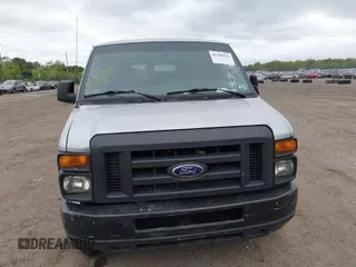 2014 Ford Econoline Cargo Commercial z VIN 1FTNE2EW7EDA73625, wystawiony jako IAAI lot #42290321 z przebiegiem 161 911 mil mil oraz . Historia ofert i sprzedaży dostępna na DreamBid. Obrazek 12.