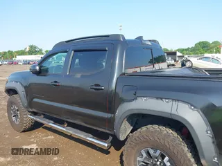 2017 Toyota Tacoma SR5 with VIN 3TMCZ5ANXHM099610, listed as a IAAI auction lot 42441050 with 85,046 mi miles and . Bid and sale history available at DreamBid. Image 14.