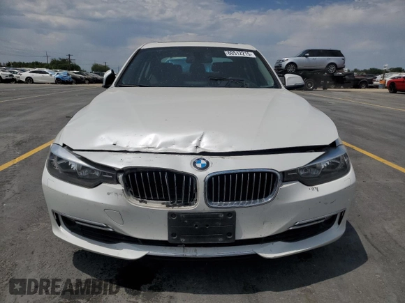 2013 BMW 3 Series 328i xDrive with VIN WBA3B3C53DF537817, listed as a Copart auction lot 60512215 with Not provided miles and Salvage title. Bid and sale history available at DreamBid. Image 5.