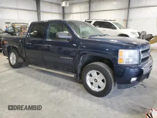 2011 Chevrolet Silverado 1500 LT with VIN 3GCPKSE33BG272919, listed as a Copart auction lot 51227155 with 140,936 mi miles and Salvage Title. Bid and sale history available at DreamBid. Image 4.