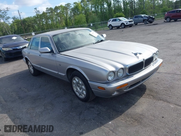 2000 Jaguar XJ with VIN SAJDA14C4YLF13470, listed as a IAAI auction lot 42136313 with 237,063 mi miles and . Bid and sale history available at DreamBid. Image 1.