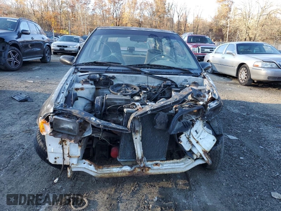 1993 Geo Metro z VIN 2C1MR2465P6722399, wystawiony jako Copart lot #78855304 z przebiegiem 224 126 mil mil oraz Szkoda całkowita • Salvage title. Historia ofert i sprzedaży dostępna na DreamBid. Obrazek 5.