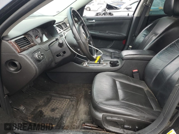 2012 Chevrolet Impala LTZ with VIN 2G1WC5E35C1317341, listed as a Copart auction lot 43404685 with 131,702 mi miles and Salvage Title. Bid and sale history available at DreamBid. Image 7.