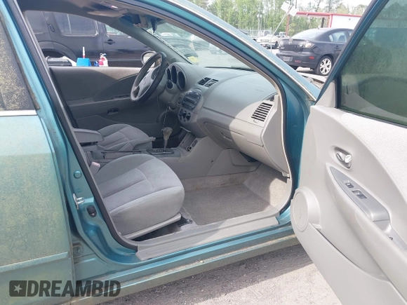 2002 Nissan Altima S with VIN 1N4AL11DX2C159926, listed as a IAAI auction lot 42091175 with 105,454 mi miles. Bid and sale history available at carsss.com. Image 5.