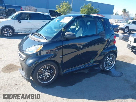 2014 Smart fortwo Pure with VIN WMEEJ3BA0EK740736, listed as a IAAI auction lot 41446173 with 68,530 mi miles and . Bid and sale history available at DreamBid. Image 2.