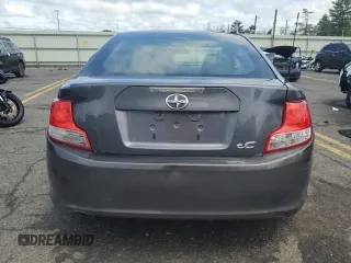 2013 Scion tC z VIN JTKJF5C71D3052789, wystawiony jako Copart lot #57482475 z przebiegiem 148 706 mil mil oraz Szkoda całkowita • Salvage title. Historia ofert i sprzedaży dostępna na DreamBid. Obrazek 6.