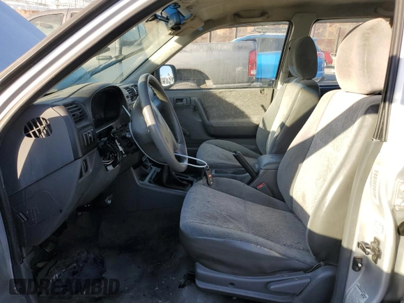 2000 Isuzu Rodeo S z VIN 4S2CK58W2Y4311726, wystawiony jako Copart lot #85070364 z przebiegiem 226 510 mil mil oraz Szkody całkowita. Historia ofert i sprzedaży dostępna na DreamBid. Obrazek 7.