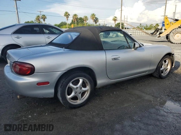 2002 Mazda MX-5 Miata Cloth with VIN JM1NB353420220801, listed as a Copart auction lot 61808645 with 116,451 mi miles and Salvage title. Bid and sale history available at DreamBid. Image 3.