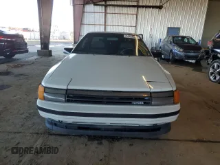 1986 Toyota Celica z VIN JT2ST64CXG7013064, wystawiony jako Copart lot #44228575 z przebiegiem 101 881 mil mil oraz Szkoda całkowita • Salvage title. Historia ofert i sprzedaży dostępna na DreamBid. Obrazek 5.