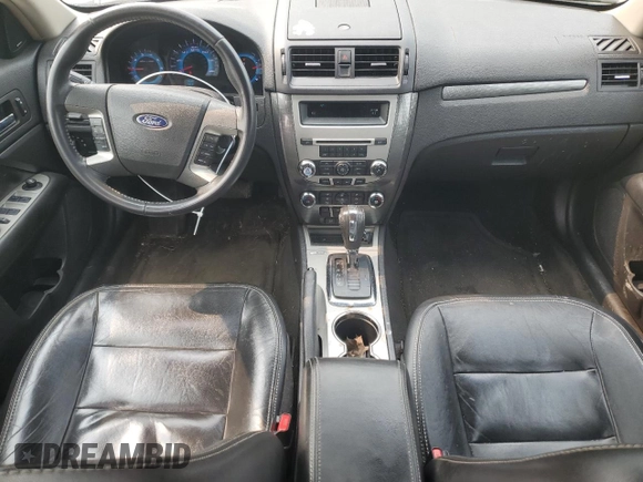 2012 Ford Fusion SEL z VIN 3FAHP0JG9CR412387, wystawiony jako Copart lot #58542715 z przebiegiem 143 112 mil mil oraz Czysty tytuł • Clean title. Historia ofert i sprzedaży dostępna na DreamBid. Obrazek 8.