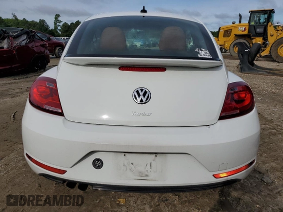 2017 Volkswagen Beetle Fleet with VIN 3VWF17AT2HM631251, listed as a Copart auction lot 58301085 with 107,808 mi miles and Salvage title. Bid and sale history available at DreamBid. Image 6.
