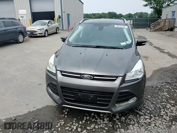 2016 Ford Escape Titanium with VIN 1FMCU9J90GUA01974, listed as a Copart auction lot 60376265 with 177,384 mi miles and Salvage title. Bid and sale history available at DreamBid. Image 14.