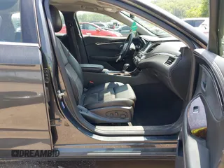 2014 Chevrolet Impala LT with VIN 2G1125S36E9156519, listed as a IAAI auction lot 42145424 with 97,755 mi miles and . Bid and sale history available at DreamBid. Image 5.