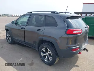 2016 Jeep Cherokee Trailhawk z VIN 1C4PJMBS1GW323434, wystawiony jako IAAI lot #42485364 z przebiegiem 130 351 mil mil oraz . Historia ofert i sprzedaży dostępna na DreamBid. Obrazek 3.