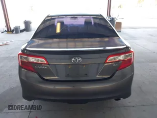 2012 Toyota Camry L with VIN 4T1BF1FKXCU617498, listed as a IAAI auction lot 42114337 with 323,770 mi miles. Bid and sale history available at carsss.com. Image 16.
