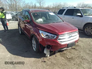 2019 Ford Escape Titanium z VIN 1FMCU0J94KUC22191, wystawiony jako IAAI lot #41792262 z przebiegiem 51 723 mil mil oraz . Historia ofert i sprzedaży dostępna na DreamBid. Obrazek 1.