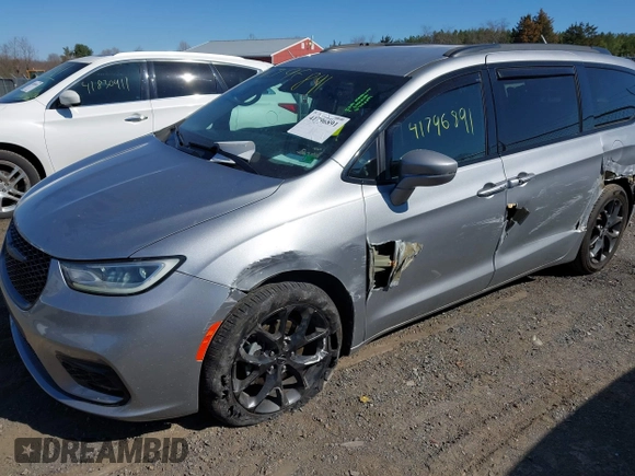 2021 Chrysler Pacifica Touring z VIN 2C4RC1FG8MR565455, wystawiony jako IAAI lot #41796891 z przebiegiem 105 645 mil mil oraz . Historia ofert i sprzedaży dostępna na DreamBid. Obrazek 2.