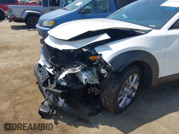 2021 Mazda CX-30 Select with VIN 3MVDMBBL9MM313039, listed as a IAAI auction lot 42575424 with 21,083 mi miles and . Bid and sale history available at DreamBid. Image 6.
