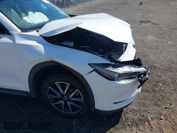 2018 Mazda CX-5 Grand Touring with VIN JM3KFBDM0J0404635, listed as a IAAI auction lot 41883068 with 71,178 mi miles. Bid and sale history available at carsss.com. Image 18.