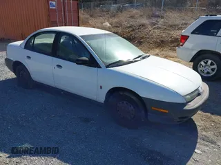 1999 Saturn SL with VIN 1G8ZH5282XZ178928, listed as a IAAI auction lot 41758412 with 249,418 mi miles. Bid and sale history available at carsss.com. Image 1.