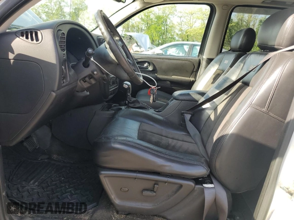2006 Chevrolet TrailBlazer LT with VIN 1GNET13H262208163, listed as a Copart auction lot 54781475 with 122,848 mi miles and Salvage Title. Bid and sale history available at DreamBid. Image 7.