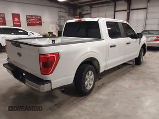 2021 Ford F-150 XL with VIN 1FTEW1C57MFA71572, listed as a IAAI auction lot 41549588 with 82,389 mi miles and . Bid and sale history available at carsss.com. Image 4.