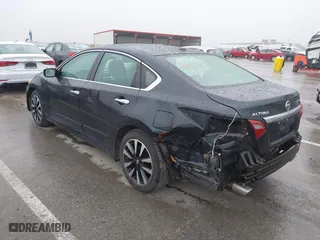 2018 Nissan Altima 2.5 SR with VIN 1N4AL3AP3JC165989, listed as a IAAI auction lot 41490589 with 84,879 mi miles. Bid and sale history available at carsss.com. Image 3.