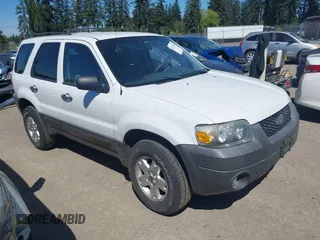 2007 Ford Escape XLT with VIN 1FMYU03127KC05177, listed as a IAAI auction lot 42199281 with 144,846 mi miles and . Bid and sale history available at DreamBid. Image 1.
