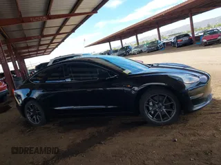 2022 Tesla Model 3 Long Range with VIN 5YJ3E1EB3NF257077, listed as a IAAI auction lot 42086629 with Not Provided miles and . Bid and sale history available at DreamBid. Image 12.