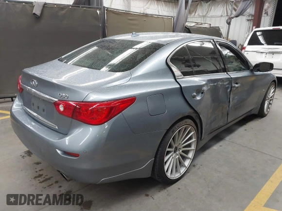 2015 Infiniti Q50 Premium z VIN JN1BV7AP6FM337369, wystawiony jako IAAI lot #41788419 z przebiegiem 106 977 mil mil oraz . Historia ofert i sprzedaży dostępna na DreamBid. Obrazek 4.