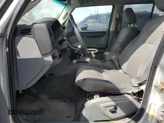 2007 Jeep Commander Sport z VIN 1J8HG48K97C505712, wystawiony jako Copart lot #72011114 z przebiegiem 146 981 mil mil oraz Szkoda całkowita • Salvage title. Historia ofert i sprzedaży dostępna na DreamBid. Obrazek 7.