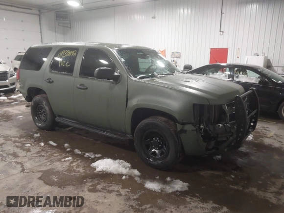 2014 Chevrolet Tahoe Commercial with VIN 1GNSK2E05ER196941, listed as a IAAI auction lot 41938892 with 176,170 mi miles and . Bid and sale history available at DreamBid. Image 1.
