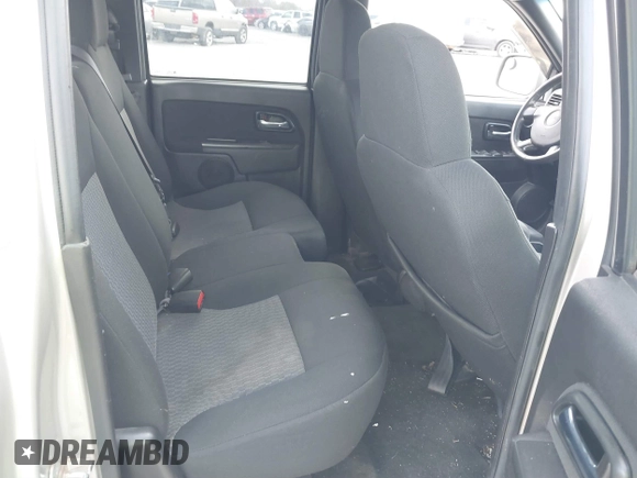2009 GMC Canyon SLE1 with VIN 1GTCS139998131563, listed as a IAAI auction lot 41561682 with 211,603 mi miles. Bid and sale history available at carsss.com. Image 8.