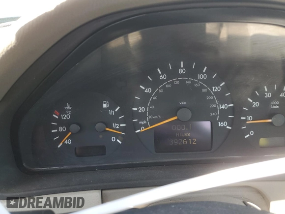 2000 Mercedes-Benz E-Class with VIN WDBJF65J1YB151080, listed as a Copart auction lot 54421955 with 392,612 mi miles and Salvage Title. Bid and sale history available at carsss.com. Image 9.